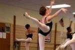 Ballerinas dancing in class.